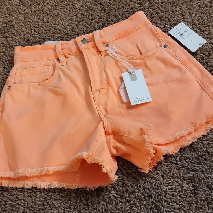 Good American 90s Shorts High Rise Nwt / No Flaws Runs Big! Stretchy Neon Coral /Orange Cream *Color Won't Show Up In Pictures Accurately. It Is Much More Of A Neon Coral Color Than What It Looks Like Online. One If My Favorite Colors! These Shorts Are Amazing I Just Need To Go Down 2 Sizes In These And I Cant Return Them As They're Final Sale Size 00 Measures: Waist 26" But Stretches To 28" 10.25" Rise 38" Hip 24" Thigh 3.25" Inseam Size 2/26 Measures: Waist 31" Unstretched But Easily Stretches Orange Cotton Bottoms For Spring, Spring Orange Cotton Bottoms, Trendy High Rise Orange Bottoms, Orange Bottoms With Built-in Shorts For Summer, Orange High Waist Bottoms For Spring, High Waist Orange Bottoms For Spring, Summer Orange Shorts With Pockets, Orange Summer Shorts With Pockets, Casual Mid-rise Orange Bottoms