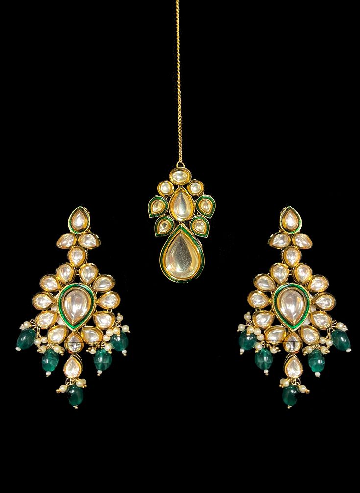 Ariana - Modern Kundan Bridal Jewelry with Pearls, Meenakari & Emeralds Contemporary Indian bridal set makes every bride's outfit perfect. This Kundan stone setting jewelry set is accented with gorgeous Polki gemstones making it one of a kind. Stunning emerald drops adorn this beautiful choker & earrings. It is further accented with extraordinary luxury pearl drops. This jewelry set is sure to make you stand out from the crowd with its elaborating green outline like Meenakari handwork. This chok Fusion Kundan Bridal Earrings For Weddings, Fusion Style Kundan Bridal Earrings For Wedding, Green Fusion Bridal Earrings With Hand Set, Fusion Kundan Wedding Sets, Fusion Chandbali Jewelry Sets For Wedding, Fusion Style Kundan Wedding Sets, Wedding Kundan Necklace With Emerald Intricate Design, Green Meenakari Bridal Earrings For Wedding, Green Kundan Traditional Wear With Stone Work