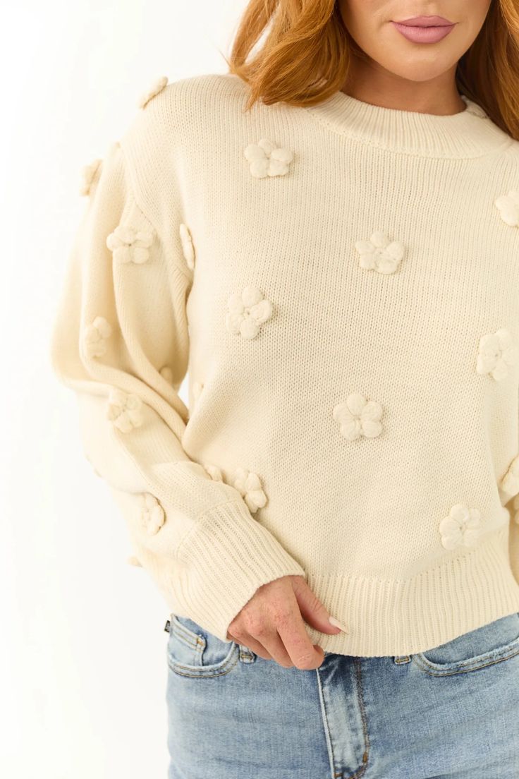 Cream Knit Floral Applique Sweater | Lime Lush Boutique Ribbed Cotton Knit Top For Fall, Cream Stretch Sweater With Ribbed Cuffs, Stretch Cream Sweater With Ribbed Cuffs, Spring Cream Sweater With Ribbed Cuffs, Cream Sweater With Ribbed Cuffs For Spring, Spring Soft Knit Turtleneck Sweater, Soft Knit Turtleneck Sweater For Spring, Cream Stretch Knit Sweater, Spring Knit Top With Ribbed Cuffs