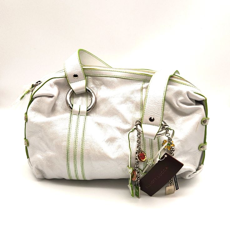 Soft White Pearlized Leather. Branded On All Hardware. Hardware Is Chrome Toned. Strap Drop Is 10". Green Trim Is Subtly Placed In Stitching And Edges Of Leather Straps. She Does Have One Small Imperfection Which Is Shown In Photo. She's A Beauty! White Shoulder Bag With Silver-tone Hardware For Travel, White Shoulder Bag With Silver-tone Hardware For Daily Use, White Shoulder Bag With Silver-tone Hardware And Double Handle, White Bags With Silver-tone Hardware And Double Handle, Designer White Satchel With Leather Handles, Designer White Hobo Bag For Daily Use, White Hobo Bag With Double Handle, White Bags With Silver-tone Hardware For Everyday Use, Designer White Satchel With Adjustable Strap