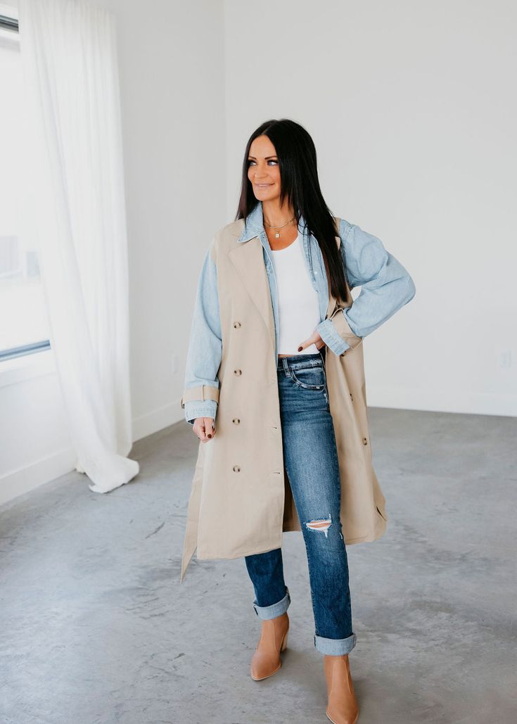 Layered look trench coat with denim jacket lining. Laurie is wearing a size small. Measurements: Body Length: 47" | Sleeve Length: 22" Small: Bust: 44" Waist: 42" Arm: 19" Medium: Bust: 45" Waist: 44" Arm: 19" Large: Bust: 46" Waist: 47" Arm: 20" Self: 66% Rayon 34% Polyester Contrast: 100% Rayon Spring Collared Outerwear For Everyday, Everyday Denim Outerwear For Fall, Oversized Denim Outerwear For Work, Spring Denim Utility Outerwear, Denim Outerwear With Lapel Collar For Fall, Spring Outerwear With Lapel Collar For Day Out, Beige Denim Casual Outerwear, Casual Beige Denim Outerwear, Trendy Collared Outerwear For Layering