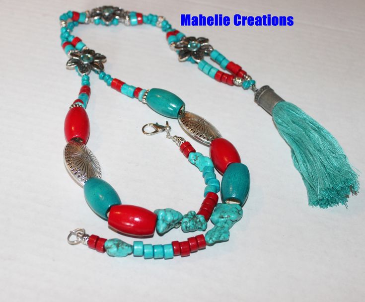 Long boho necklace with tassel, statement beaded necklace, bold chunky necklace, tribal necklace, long beaded necklace This necklace measures about 26" (around the neck) but can be extended at your request to fit your need and free of charge. The long chest piece in about 12" long.  I used an assortment of turquoise and red wood beads for this stunning necklace. The large barrel turquoise and red wood beads are about 30 x 18mm in size. The flowers are about 4.5 x 4.5" in size. The blue turquoise tassel is about 1.5" in length. Let me know if you have questions. Thank you for stopping by! Bohemian Tassel Necklace With Dangling Beads For Beach, Bohemian Long Tassel Necklace With Dangling Beads, Bohemian Tassel Necklace With Dangling Beads, Turquoise Beaded Necklace With Tassels, Bohemian Style, Turquoise Bohemian Beaded Necklace With Tassels, Bohemian Long Necklace With Large Beads For Beach, Long Boho Necklace, Long Necklace Boho, Red Wood