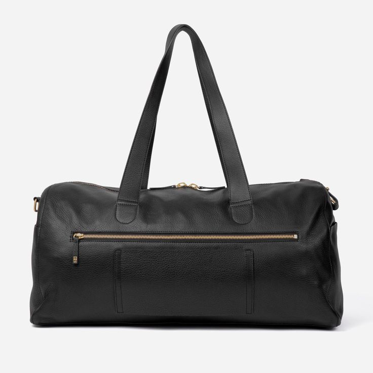 Whether you're going halfway around the world or from your workout class to the office, this sophisticated yet versatile duffle bag is your go-to companion. With endless carrying options and convenient pockets, the slouchy full grain leather and solid brass hardware perfect this elegant travel bag. Adjustable, removable strap Convertible design (crossbody, top handle or shoulder bag) 2 exterior side slip pockets Luggage slip Secure exterior zipper pocket Solid brass hardware Unlined interior Sof Versatile Leather Weekender Bag For Trips, Versatile Leather Weekender Bag, Classic Duffle Bag With Large Capacity For On-the-go, Versatile Leather Duffle Bag, Luxury Everyday Gym Bag, Versatile Leather Duffle Bag For Daily Use, Functional Duffle Bag For Business Trips With Leather Trim, Versatile Everyday Leather Gym Bag, Versatile Leather Gym Bag For Everyday Use