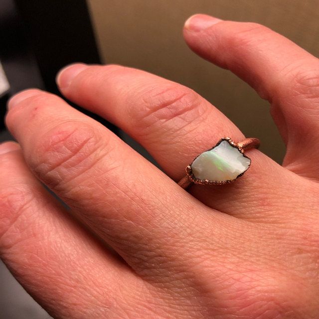 Raw opal ring Australian opal ring Rough opal ring Raw | Etsy Unique Opal Gemstone Rings, Opal Gemstone Ring As A Gift, Opal Crystal Open Ring With Gemstone, White Opal Open Ring, Opal Moonstone Open Ring For Gift, Opal Gemstone Open Ring, Unique Opal Ring With Birthstone, Rose Gold Opal Gemstone Ring, Fine Jewelry Ethiopian Opal Ring As Gift