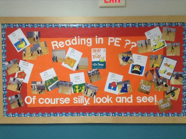 a bulletin board with pictures on it in a classroom setting that reads reading in pe 2 - 3