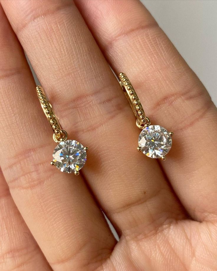 1.70CTW Moissanite Latch back Clip Earrings, 14k Gold Hoops, Dangle Hoop Wedding Earrings,Anniversary Gift,Huggie Hoop Earrings,Gift For Her ♣ Stone Details ☛ Stone Weight & Size: 1.70CTW (6.0 MM) Round Cut Moissanite ☛ Stone Color: (White) ☛ Clarity - VVS1 ☛ Luster: Excellent ☛ Hoops Width: 1.80 MM ☛ Hoops length: 10.50 MM ☛ Make: High Quality ☛ Center Shape: Round Cut Moissanite ☛ Metal Change(10k/14k/18k White/Yellow/Rose Gold) ☛ Handmade item ★ Moissanite Guarantee :   Test By Diamond Tester Its Test Show Positive 100% I accept custom-making orders. please contact me if you need this service. All the jewelry in my store is handmade .it may take 2-3 weeks to finish. ♣ Buy with Warranty: ☛ 14 Days Money Back Guarantee; ☛Excellent Customer Service; ☛  Free Shipping and insurance WORLDWIDE Gold Moissanite Earrings For Anniversary, Gold Moissanite Anniversary Earrings, Gold Cubic Zirconia Bridal Earrings With Round Cut, Gold Moissanite Earrings Fine Jewelry, Yellow Gold Round Cut Hoop Earrings For Anniversary, Gold Hoop Earrings With Brilliant Cut For Anniversary, Wedding Dangle Diamond Hoop Earrings, White Gold Dangle Hoop Earrings For Anniversary, White Gold Dangle Hoop Earrings For Wedding