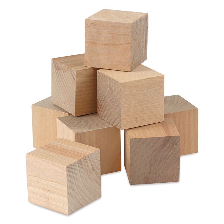 several wooden blocks stacked on top of each other