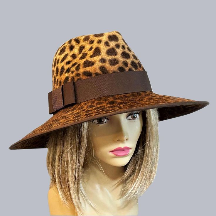 This beautiful ladies fedora is made from velour fur felt, and hand draped over an antique hat block. Hand finished with authentic millinery techniques. Embellished with grosgrain ribbon. This hat has a higher crown, 5 1/4" and wider brim, 4.5". The edge of brim is wired and embellished with contrast grosgrain ribbon  Please indicate your head size measurement when ordering (measure your head horizontally just above your eyebrows). When you receive your hat, there will be a small ribbon inside t Leopard Print Hat, Antique Hat, Hat Blocks, Antique Hats, Elegant Hats, Millinery Hats, Antique Brooches, Hat Box, Beautiful Ladies