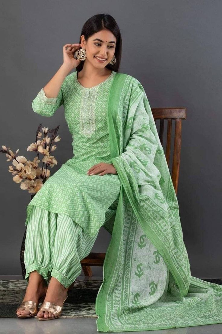 * Kurta sets 3 pcs * Kurti- cotton printed fabric with coding dori embroidery  Pant- cotton printed afghani pattern pant  Dupatta- cotton malmal printed fabric  Quality: 100 % Guaranteed Stitched: Yes Full Stitched Sleeve length: 3/4 sleeve Pockets: No Leg/hem length: Mid-calf Neckline: Boat Kurta style: Straight Fabric technique:  Embroidered Wash Care: Machine Wash & Hand Wash In Cold Water Using Mild Detergent. Shipping - We use globally known Logistics for best services like Fed-Ex, DHL, India Post. It usually takes around 7 - 15 day to deliver in Standard Delivery OR 3 - 7 Day in Express. Return - We gladly accept return in light of Etsy Guidelines. Please contact us before raising a Return Request, we may be more useful in resolving your issues. Thank you so much for visiting. Have a Traditional Pista Green Sharara With Printed Motifs, Green Palazzo Set With Printed Motifs For Navratri, Green Mulmul Palazzo Set With Chikankari Embroidery, Embroidered Pista Green Cotton Salwar Kameez, Pista Green Embroidered Cotton Salwar Kameez, Green Sharara With Chikankari Embroidery In Mulmul, Green Mulmul Sharara With Chikankari Embroidery, Green Embroidered Cotton Palazzo Set, Pista Green Cotton Traditional Wear With Resham Embroidery