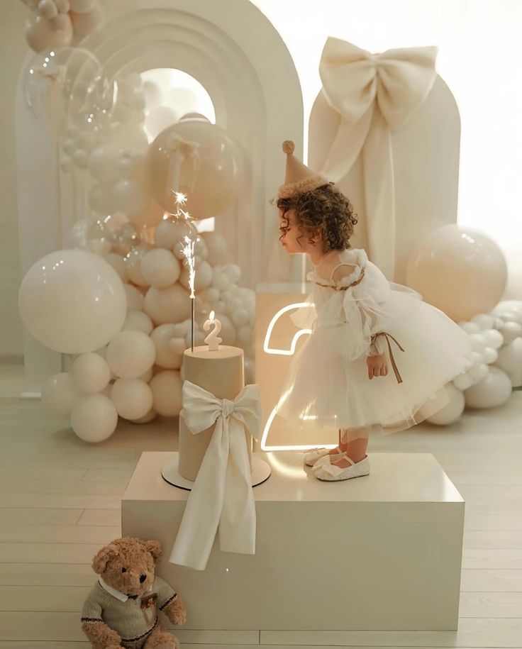 2 year old baby birthday party styling, white simple bow decoration🎂 #babybirthdayparty #2ndbirthday #2ndbirthdayparty #2ndbirthdaycake #babybirthdayideas #babybirthdaydeco #babybirthdayphotography #babybirthdayphotoshoot #birthdaydecoration #birthdayballoons Birthday Idea 1 Year, Two Year Party Theme, One Year Old Birthday Party Decorations, 1st Birthday Crib Pictures, Balloon Decorations Party Simple, White Decoration Birthday, All White First Birthday Party, 1 Year Party Ideas, Birthday Bow Theme