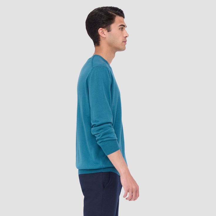 The Scott crew neck sweater in 100% extra-fine Merino wool with Harmony 4.0 special finish is made in Italy and features a ribbed neckline, sleeve cuffs and waistband. This sweater is made with a high-twist yarn that's breathable, moisture-wicking, water repellent, machine-washable, and crease-proof for long lasting performance wash after wash. Long Sleeve V-neck Sweater With Ribbed Cuffs For Loungewear, Classic Crew Top With Ribbed Cuffs, Classic Crew Neck Top With Ribbed Cuffs, Classic Sweater With Ribbed Cuffs For Loungewear, Classic Sweater With Ribbed Neckline For Loungewear, Modern Crew Top With Ribbed Cuffs, Modern Crew Tops With Ribbed Cuffs, Crew Neck Sweater With Ribbed Waistband For Layering, Classic Loungewear Sweater With Ribbed Neckline