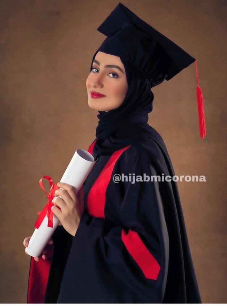 a woman wearing a graduation gown and holding a diploma in her right hand with a brown background