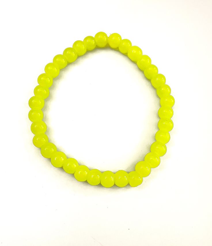 The sunshine yellow glass beads create this bright bracelet that can be stacked with three or five bracelets. Focal: Sunshine yellow glass beads Stretchy bracelet Size: Small Yellow Beaded Stretch Bracelet With Round Beads, Yellow Beaded Stretch Bracelet, Casual Yellow Beaded Bracelets With 8mm Beads, Casual Yellow Beaded Bracelet With 8mm Beads, Adjustable Lime Green Beaded Bracelets, Adjustable Yellow Hand-strung Bracelet, Adjustable Yellow Round Bracelets, Adjustable Yellow Beaded Crystal Bracelet, Adjustable Beaded Yellow Crystal Bracelet