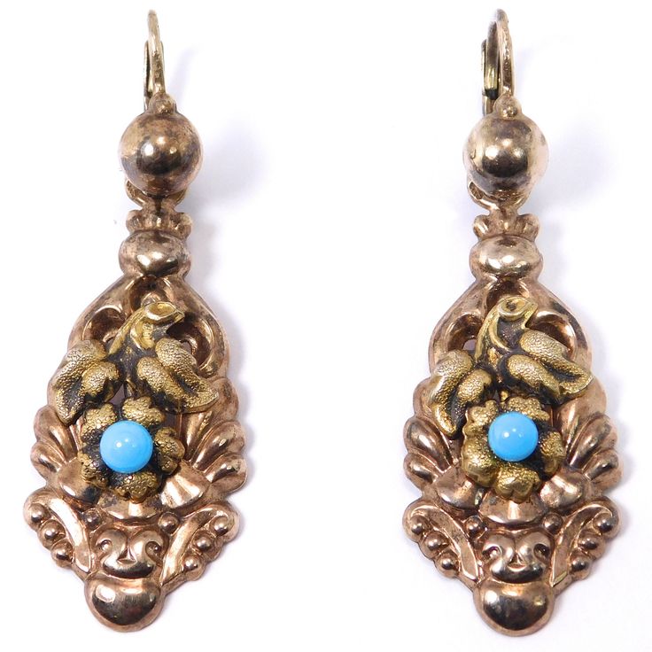 Amazingly beautiful old gold gilt silver earrings with small persian turquoise colored glass beads.  Hallmarked for the Republic of Austria for 835 silver and the city of Linz.  Measures 1.5 inches long and just over ½ inch wide.  Could use a polish if so desired but they have a nice patina and are in excellent condition.  Lever back closure and just really nicely made like wearable little works of art. Antique Pendant Yellow Gold Earrings, Antique Yellow Gold Pendant Earrings, Antique Style Drop Earrings With Antique Finish, Antique Drop Earrings With Antique Finish, Antique Pendant Earrings For Jewelry Making, Victorian Drop Earrings With Antique Finish, Antique Bronze Drop Earrings, Victorian Antique Finish Drop Earrings, Antique Gold Drop Earrings Jewelry