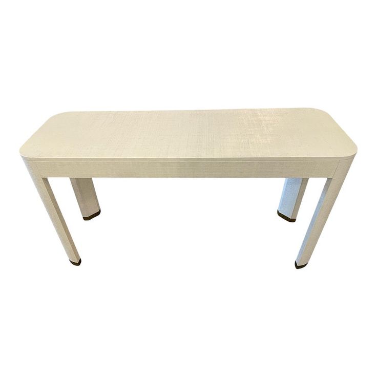 a white table with metal legs on a white background