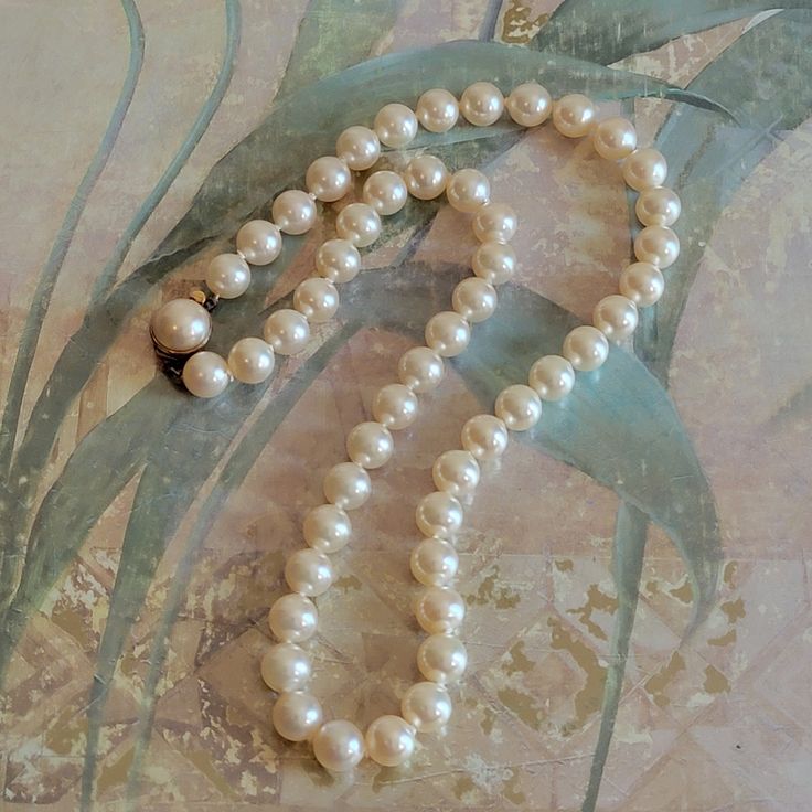 This is a vintage, original box any pamphlets, Majorica pearl necklace. The clasp is marked and it tested positive for sterling silver. I think this is from 1985, according to the pamphlet. All sales are final. The pearls measure 8 mm across. The necklace is 18 inches in length.  If you have a wish list or are looking for something specific, please ask. I may have exactly what you are looking for. As always please convo me with any questions or concerns regarding this item or with any international shipping questions. Unfortunately I do not accept returns or grant refunds. All shipping fees include handling fees. If you would like to combine shipping costs for more than one item, I would be happy to do so if you convo me before purchase. Purchasing my item means you have read, understood a Vintage Round Pearl Necklace For Formal Occasions, Vintage Pearl White Necklace For Anniversary, Vintage Pearl Necklace For Formal Occasions, Vintage Pearl White Pearl Necklace Gift, Vintage Pearl White Round Beads Necklace, Vintage Pearl White Pearl Necklace With Round Beads, Vintage Pearl White Round Bead Necklaces, Vintage Pearl White Pearl Necklace For Gift, Vintage Pearl White Jewelry For Anniversary