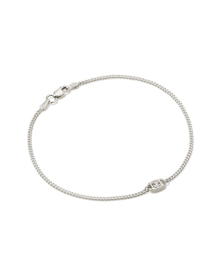 Make a bold addition to your bracelet stack with the Delaney Sterling Silver Curb Chain Bracelet in White Sapphire. Featuring a curb chain and a striking stone, this one is an edgy-yet-elegant wrist stacker you can wear all day, every day. Metal Sterling Silver Why Sterling Silver? Our Sterling Silver collection features elevated styles to wear time and time again. With a base of both pure silver and copper, Sterling Silver provides a precious yet affordable option that offers long-lasting wear Jewelry Silver Aesthetic, Kendra Scott Bracelet, Silver Jewlery, Curb Chain Bracelet, Silver Collection, Demi Fine Jewelry, Shopping Spree, White Sapphire, Christmas Wishlist