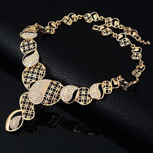 Women's Wedding Gift Fashion Crystal Choker Necklace Earring Bangle Bracelet Ring ladies Jewelry Set Model Number:32612189263 Get the look of classic elegance with this jewelry set. Including choker necklace, bracelet, statement ring, chandelier earrings, all inlaid with clear crystals, quite deluxe and stylish. Perfect for wedding, party, banquet, jewelry gift for your friends.Type: Jewelry SetMaterial: Alloy & RhinestoneFeatures: Hollow Out Choker Necklace, Band Ring, Bangle, Chandelier Ear St Wide Choker Necklace, Rhinestone Jewelry Set, Ring Chandelier, Crystal Choker Necklace, Crystal Jewelry Sets, Big Hoop Earrings, Tassel Jewelry, Bracelet Ring, Crystal Choker