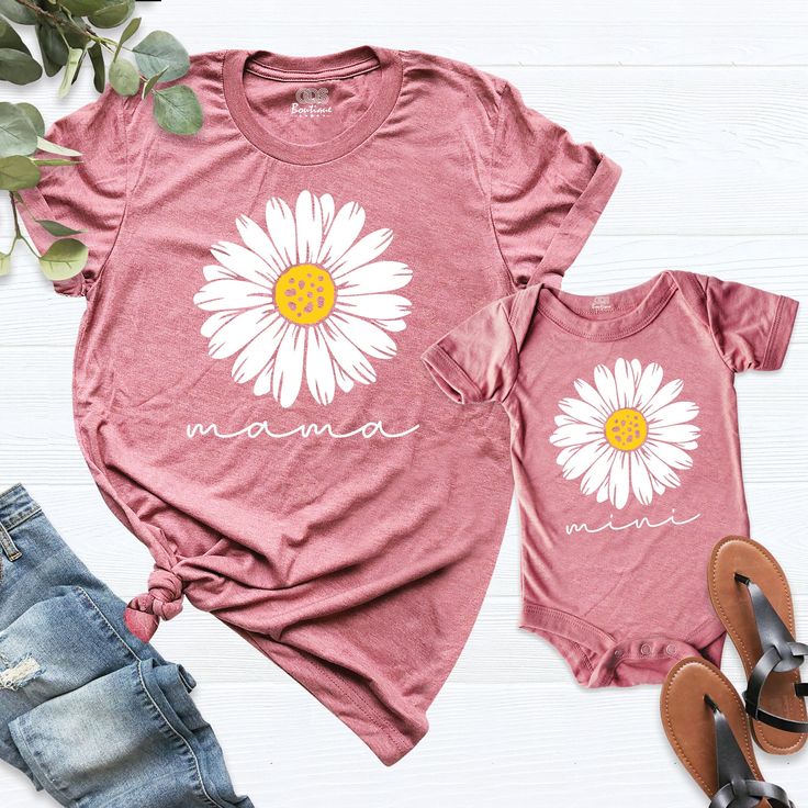 Mommy And Me Shirts, Mama Mini Shirt, Cute Mom baby Shirt, Daisy Mom Shirt, Mama Shirt, Matching Shirt, Flower Mom Shirt, Mother day Shirt. HI! Welcome to my store, I'm delighted to see you here. My store's main goal is to provide you with premium everyday apparel with the best graphic t-shirts. I see you as a friend, not just a customer. I'm sure you'll love my designs. You can order the same design 4XL and 5XL large sizes from the link, please specify the details in the order note.   https://e Cute Crew Neck Tops For Mother's Day, Family Matching Letter Print Shirt For Spring, Family Matching Crew Neck Shirt For Spring, Casual Cartoon Print Top For Mother's Day, Family Matching Cotton Tops For Spring, Spring Family Matching Long Sleeve Tops, Family Matching Long Sleeve Tops For Spring, Casual Tops With Cartoon Print For Mother's Day, Pink Relaxed Fit Tops For Mother's Day