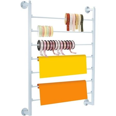 a white rack with several rolls of tape on it