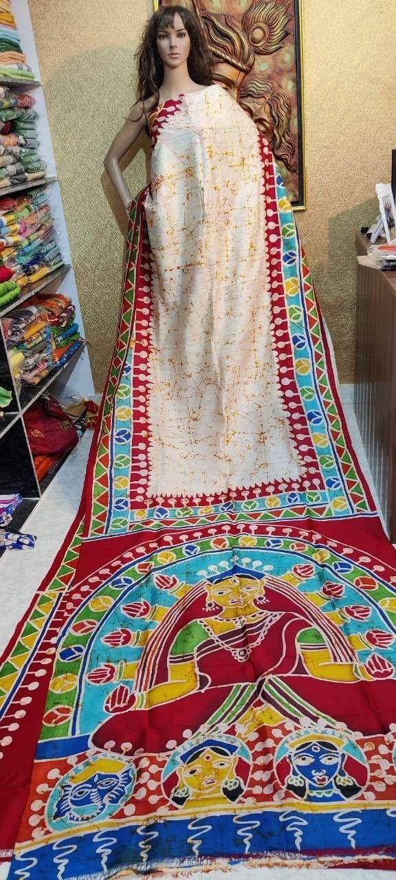 This design based on the Traditional Maa durga drawing art work mix batik work over the saree.  Feel the Original Murshidabadi/Bishnupu Silk, It comes with hand paint design by the artist, Every painting 🎨🖌dedicated to the nature story of Indian art, forest, trees, animals, and also the flavor of every culture expect of our Indian tradition, Not only the design the yarn cultivation to the processes of it's all stages are very much challenging that gives the saree more flavor on it. Feel the touch of the real Bishnupur. 🛑🙏if you want fals pico on your saree please message me🙏🛑 Festive Bohemian Saree With Batik Print, Bollywood Style Batik Print Saree For Diwali, Bohemian Batik Print Saree For Festive Occasions, Bohemian Batik Print Saree, Diwali Batik Print Saree In Traditional Drape, Traditional Diwali Saree With Batik Print, Traditional Batik Print Saree For Diwali, Traditional Drape Saree With Batik Print For Diwali, Chanderi Saree With Batik Print