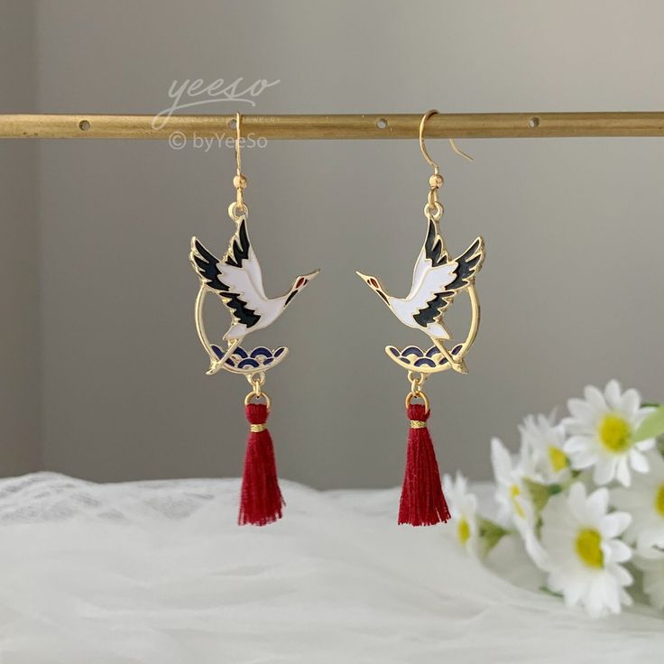 Crane with Red Tassel Earrings Dangle, Japanese Crane Earrings, Oriental Red Earrings, unique earrings Dangle 🤍 Hypoallergenic 🌸 Handmade with love ✨ Cute & Dainty  🎁 Gift ready 〰️Click👇🏻 Find more Earrings🎀  https://www.etsy.com/shop/byYeeSo ◽️ PACKAGING ◽️  * The jewelry will be nicely packaged * Comes with a drawstring suede pouch * If you need personalized gift note, please click the link below, add it to your cart when check out to upgrade your packaging. https://www.etsy.com/listing/1008661207/upgrade-gift-packaging?ref=shop_home_active_1&frs=1 ◽️ SHIPPING ◽️ * USPS First Class Shipping Service with tracking number * All products will be shipped from USA ◽️ CARE INSTRUCTIONS ◽️ * Avoid perfumes or sprays * Avoid getting your jewelry wet * Wipe down the jewelry to remove oils an Elegant Red Tassel Earrings As Gift, Elegant Red Tassel Earrings For Gift, Elegant Red Handmade Tassel Earrings, Elegant Handmade Red Tassel Earrings, Elegant Red Tassel Drop Earrings, Handmade Elegant Red Tassel Earrings, Handmade Red Tassel Earrings, Elegant Style, Red Chandelier Earrings As Gift, Red Dangle Clip-on Earring