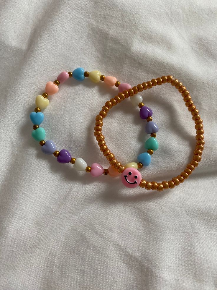 A preppy beaded bracelet set with pastel colours !⚡️💞 This handmade bracelet is stretchable so it will fit most children's and adults wrists. Let me know if you need a smaller or larger size and i can custom make it for you. Please don't over stretch the bracelets or they may snap. If you have any questions I will be happy to answer them!  Thanks for reading! ☺️ Cute Everyday Beaded Bracelets, Playful Yellow Friendship Bracelets With Letter Beads, Adjustable Kawaii Beaded Bracelet For Birthday, Adjustable Pastel Beaded Bracelets Playful Style, Cute Rainbow Friendship Bracelets For Everyday, Cute Everyday Beaded Bracelets With Colorful Beads, Cute Everyday Rainbow Friendship Bracelets, Cute Stretch Bracelet With Colorful Beads, Cute Colorful Adjustable Stretch Bracelet