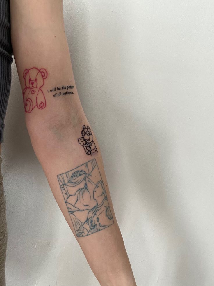 a person with a bear tattoo on their arm