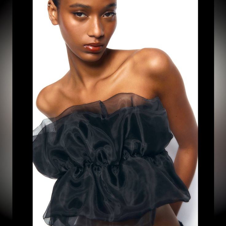 Nwt. Never Worn. Brand New Condition. Strapless Straight Neck Top Made Of Organza. Please Review Pictures. Color: Black Outer Shell Main Fabric 94% Cotton 6% Elastane Secondary Fabric 100% Polyester Sheer Chic Crop Top For Summer, Chic Sheer Crop Top For Summer, Flirty Off-shoulder Tops For Party, Spring Black Off-shoulder Tube Top, Chic Sheer Sleeveless Crop Top, Off-shoulder Crop Top For Summer Evenings, Off-shoulder Evening Crop Top For Summer, Summer Evening Off-shoulder Crop Top, Elegant Ruffled Bandeau Tube Top