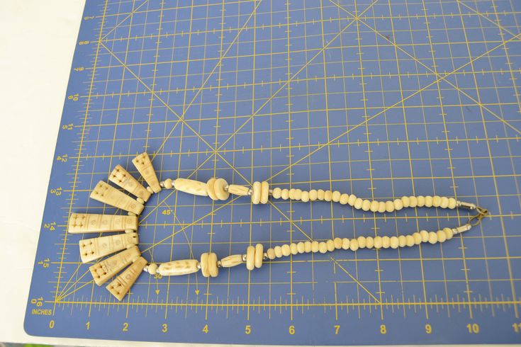 Tribal bone necklace tribal boho vintage necklace bone necklace White Bohemian Jewelry With Wooden Beads, Bohemian White Jewelry With Wooden Beads, Bohemian Beige Necklaces With Wooden Beads, Bohemian Beige Necklace With Wooden Beads, Bohemian Cream Jewelry With Wooden Beads, Adjustable Vintage Beige Necklace, Vintage Adjustable Beige Necklace, Handmade Bone-colored Unique Necklace, Vintage Beige Adjustable Necklace