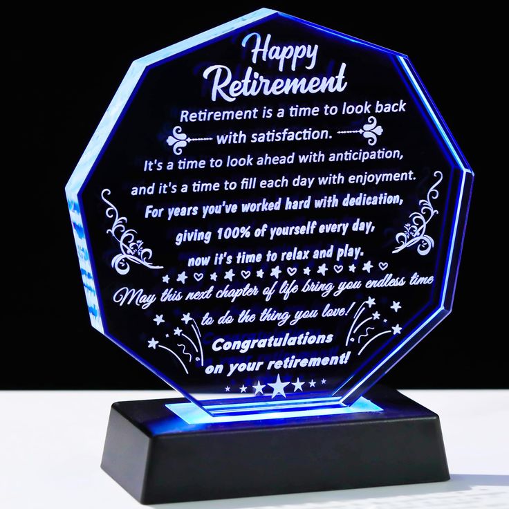 an illuminated plaque with the words happy retirement on it