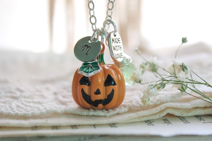 You can celebrate the Fall Season and Halloween all year long with this personalized Initial and birthstone Jack O Lantern Pumpkin.   Designed from high quality silver plated material, it will last a lifetime! The perfect keepsake gift for anyone celebrating their birthday in October. Select your necklace Initial, and birthstone from the drop-down menu when checking out. Add your choice of necklace length in the Personalization comment box. ✦Enjoy one FREE polishing cloth with your order Designe Halloween Themed Jewelry Gift, Personalized Halloween Jewelry Gift, Halloween Themed Personalized Jewelry, Personalized Themed Jewelry For Halloween, Themed Personalized Jewelry For Halloween, Halloween Novelty Personalized Jewelry, Personalized Silver Necklace For Halloween, Orange Necklace For Halloween Gift, Birthday In October