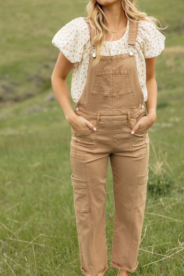 Sometimes all you need is a good pair of overalls. The Ralph Denim Overalls feature adjustable straps, cargo pockets, and detailed straps. Grab your favorite tee or tank and you've got a trendy and cute outfit! all pockets functional // paired with the wrinkle in time button down blouse + the los Angeles 1993 graphic tee Runway Moments, Wrinkle In Time, Casual Outfit Ideas, Double Denim, Nursing Friendly, Style Looks, Denim Overalls, Button Down Blouse, Street Style Looks