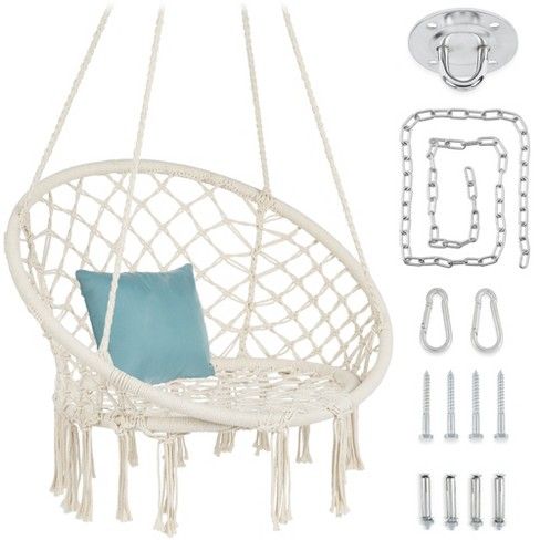 a white hanging chair with blue cushion and accessories for the seat, including chains, hooks,