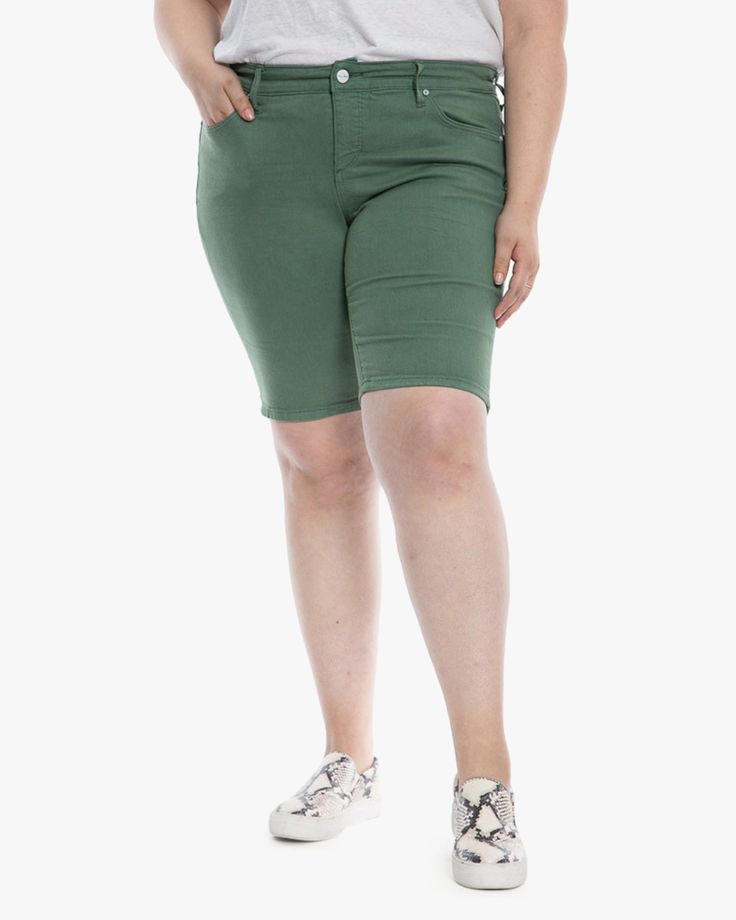 These super soft and chic denim Bermuda shorts are done in a pretty summery green and have five pockets. Try them with a tee or peasant blouse and mules. These plus-size shorts are ready for summery weather, comfy tees, and flirty cutout tops. Slink Jeans Haley Mid rise Bermuda | Light Green | Jeans | Materials & Care Instructions: ['58% Cotton, 39% Rayon, 3% Spandex', 'Machine wash cold', 'Imported'] Green Cotton Shorts For Day Out, Green Bermuda Shorts With Built-in Shorts For Summer, Casual Green Shorts For Spring, Trendy Mid-thigh Jean Shorts For Spring, Trendy Mid-thigh Length Jean Shorts For Spring, Spring Green Bermuda Shorts With Built-in Shorts, Casual Green Bermuda Shorts For Spring, Green Relaxed Fit Bermuda Shorts For Spring, Casual Green Knee-length Bottoms