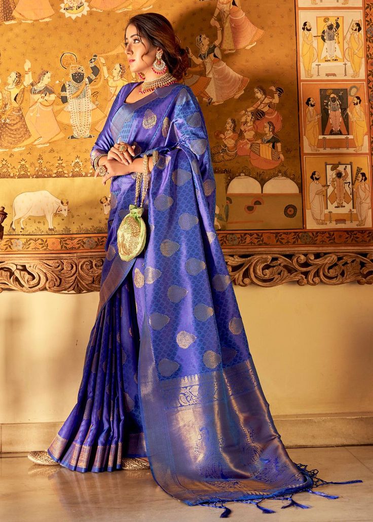 ROYAL STRIKING BLUE WOVEN KANJIVARAM SILK 105  Desc:      Intricate timeless design on this grand saree is perfect for a grand occasion this Kanjivaram saree will easily attract eyes. With exquisite design spread across the length of the saree it is perfect for any occasion. This saree has a white tone with a slight blend of gold colour. It has been the best seller till date!Saree length : 5.5 meterBlouse piece :  0.8 meterFabric : Blended silk and Zari. With Express Free Shipping and Custom Sti Indigo Traditional Wear For Wedding, Elegant Blue Pre-draped Saree For Puja, Blue Wedding Pre-draped Saree With Zari Weaving, Indigo Traditional Wear For Wedding And Navratri, Royal Blue Cutdana Dupatta, Bollywood Indigo Traditional Wear For Diwali, Bollywood Style Indigo Traditional Wear For Diwali, Indigo Bollywood Traditional Wear For Diwali, Indigo Anarkali Traditional Wear For Festivals