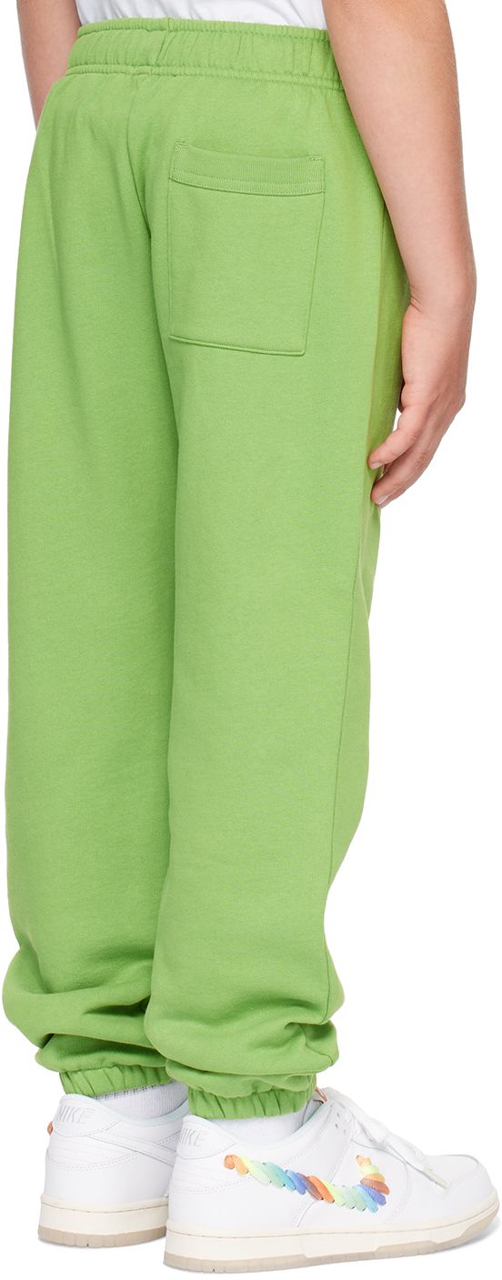 GOTS-certified organic cotton French terry sweatpants. · Drawstring at elasticized waistband · Three-pocket styling · Embroidered logo patch at front · Machine-wash Supplier color: Herb green Model measures 54” / 137.2 cm tall and wears size 8-10Y. Acne Studios Size: child's height 3-4Y: 38.5-40 / 98-104 cm 4-6Y: 40-45.5 / 104-116 cm 6-8Y: 45.5-50 / 116-128 cm 8-10Y: 50-55 / 128-140 cm Green Sweatpants With Elastic Waistband For Loungewear, Green Sweats With Elastic Waistband For Loungewear, Green Relaxed Fit Pants With Elastic Cuffs, Spring Green Joggers With Side Pockets, Green Sweatpants With Ribbed Waistband For Loungewear, Green Relaxed Fit Sweats With Elastic Waistband, Green Relaxed Fit Joggers With Elastic Waistband, Green Relaxed Fit Sweatpants For Loungewear, Green Relaxed Fit Pants For Jogging