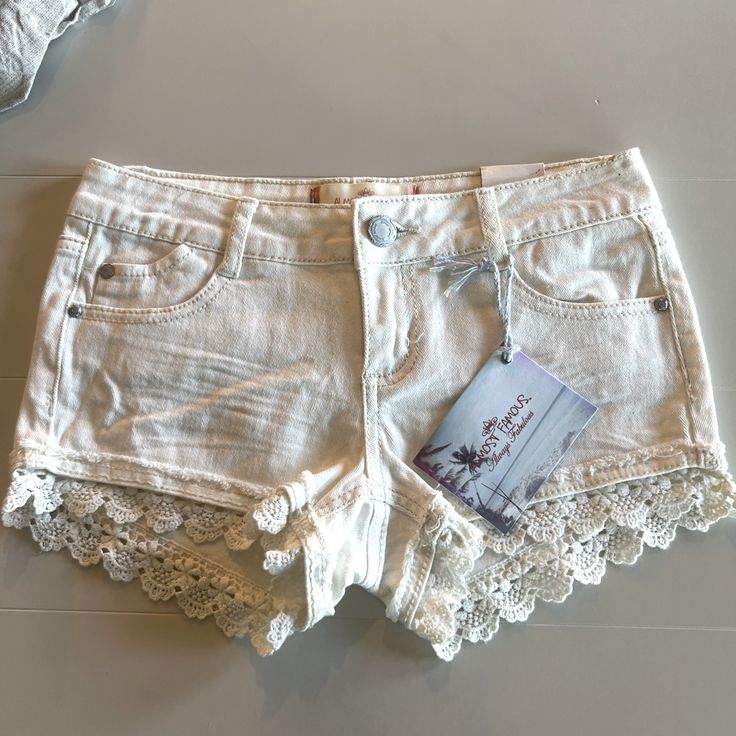 Here Shorts Have Never Been Worn And Are New With Tags! Trendy Stretch Bottoms With Lace Trim, Casual Stretch Bottoms With Lace Trim, Trendy Bottoms With Lace Trim, Casual Fitted Bottoms With Lace Trim, Short Cotton Bottoms With Lace Trim, Summer Stretch Bottoms With Lace Trim, Stretch Bottoms With Lace Trim For Summer, Casual Bottoms With Lace Trim For Spring, Casual Lace Trim Bottoms For Spring