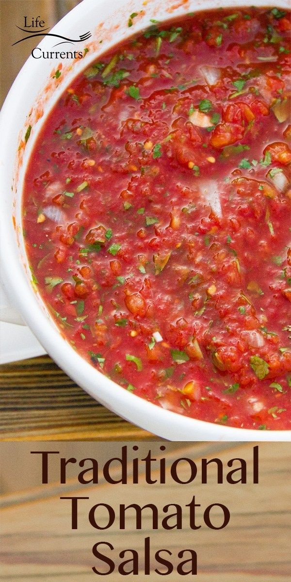 traditional tomato salsa in a white bowl on a wooden table with the title above it