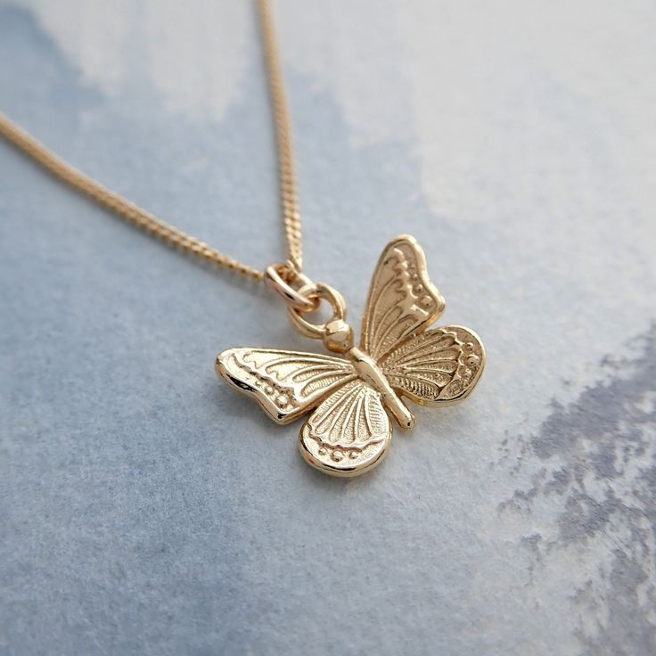 Our dainty Gold Butterfly Necklace is 18k Gold Vermeil. This lightweight necklace would look lovely on it's own or layered with other necklaces. The tiny butterfly charm is strung on a fine 18k gold vermeil curb chain. The curb chain is diamond cut and reflects the light beautifully. Your butterfly necklace will arrive carefully packaged and presented in a Silver Willow gift box, making it a perfect gift for a loved one or a special treat for yourself. Details: * Necklace length 18'' * The chain Butterfly Gold Necklace, Summery Necklace, Butterfly Jewelry Necklace, Jewellery Dainty, Butterfly Jewellery, Gold Butterfly Necklace, Tiny Butterfly, Summer Jewellery, Butterfly Necklace Gold