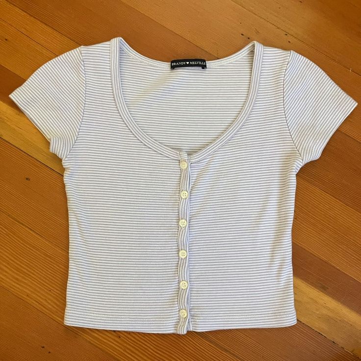 -One Size -Brand New, No Damages -Originally $20 -Perfect Condition -Never Worn Trendy White Top With Snap Buttons, White Buttoned Top For Everyday Wear, Everyday Striped Tops With Buttons, Striped Tops With Buttons, Everyday Striped Buttoned Tops, Fitted Tops With Snap Buttons For Day Out, Striped Fitted Tops With Button Closure, Fitted Striped Tops With Button Closure, Zelly Top