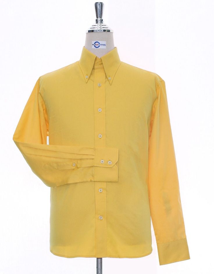 Modshopping classic Men's tailored made men dress shirt for any occasion  Color: Mustard Yellow Collar: Button down long collar  Collar length: 4 inches  Cuff: Notch cuff detail  A unique tailored feel  Dart at the back   Brilliant tailored fitted Men's shirt. Fabric 100% cotton  hand wash & machine wash only Solid Dress Shirt With Spread Collar For Spring, Long Sleeve Cotton Dress Shirt With Buttons, Spring Solid Dress Shirt With Spread Collar, Spring Solid Color Dress Shirt With Spread Collar, Solid Spring Dress Shirt With Spread Collar, Classic Button-up Dress Shirt For Spring, Fitted Button-up Shirt With Buttons, Classic Spring Button-up Dress Shirt, Fitted Dress Shirt With Spread Collar And Buttons