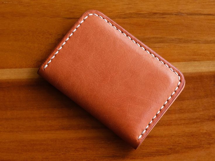 Brown Vertical Wallet We use Vegetable Tanned Leather for this product. Veg-Tan leather is known for its high quality characteristics. It is bound to age overtime, and experience a leather patina (color-change). We're very selective when it comes to selecting the leather, and we use only the finest full-grain leather that could last you for YEARS.  We also use saddle (handstitch) construction, which mean the stitching won't unravel even if a thread falls off (which is very rare itself) If you ar Vegetable-tanned Leather Wallet For Daily Use, Vegetable-tanned Trifold Wallet For Daily Use, Rectangular Vegetable Tanned Leather Wallet, Vegetable-tanned Leather Wallet, Daily Use Vegetable-tanned Trifold Wallet, Daily Use Vegetable-tanned Leather Wallet, Brown Vegetable Tanned Leather Wallet For Everyday Use, Brown Vegetable Tanned Leather Wallets For Everyday Use, Brown Vegetable-tanned Trifold Wallet For Daily Use