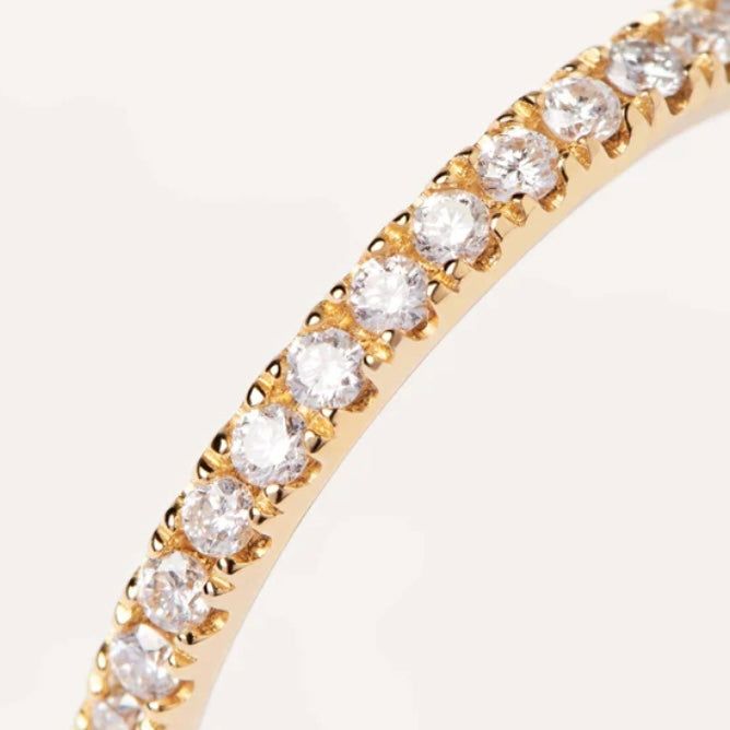 Introducing our exquisite Diamonds and Gold Eternity Medium Ring, tailored for the sophisticated woman who embraces timeless elegance. A mesmerizing array of brilliant diamonds encircle this opulent 18K gold band, captivating every gaze with its unparalleled allure. Graceful, alluring, and captivating - it epitomizes perfection. Embrace eternal beauty, adorned with pure luxury, and let your imagination dance with delight. Sublime sparkle, delicate grace, and a tactile delight - a scintillating m Dazzling Cubic Zirconia Rings For Everyday Luxury, Everyday Luxury Diamond Rings With Brilliant Cut, Elegant Vvs Clarity Diamond Ring For Everyday Luxury, Elegant Everyday Luxury Diamond Ring With Vvs Clarity, Everyday Luxury Brilliant Cut Diamond Rings, Elegant Gold Eternity Band With Diamond Accents, Timeless Half Eternity Cubic Zirconia Diamond Ring, Everyday Luxury Cubic Zirconia Rings With Brilliant Cut, Everyday Luxury Diamond Ring With Accents