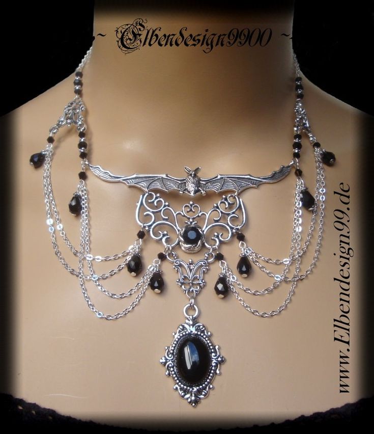 A very elegant choker in gothic style, which, like all my jewelry, was made with great care and attention to detail. The necklace was made from silver-plated metal ornaments with black faceted glass beads and black glass stones. Black diamond rhinestones were also used. The chain is adjustable from approx. 39 cm-46 cm, with a black drop hanging on the extension chain. Black Vampire Pendant Jewelry, Gothic Choker Necklace For Halloween, Black Vampire Style Pendant Jewelry, Elegant Halloween Festival Necklaces, Black Fantasy Pendant Necklace, Silver Vampire Choker For Halloween, Black Vampire Jewelry For Festival, Vampire Style Black Jewelry For Festivals, Gothic Choker Necklace For Jewelry Making