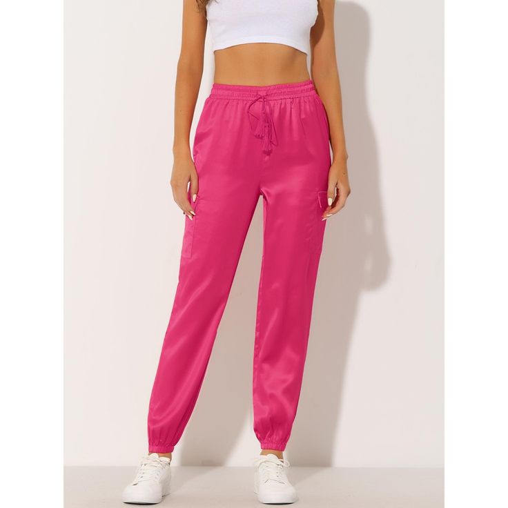 Master the chic look while staying comfy with the High Waist Satin Cargo Pants. The soft satin fabric shapes the stylish pants with an elasticized, drawstring waist and loose straight legs. Elastic waist with matching color drawstring, and relaxed elastic cuffs at the ankles, easy to pull on and take off. Two cargo pockets make you look cool. Pink Athleisure Joggers With Drawstring, Pink Drawstring Casual Joggers, Pink Casual Joggers With Drawstring, Pink Drawstring Pants For Loungewear, Pink Drawstring Lounge Pants, Pink Drawstring Loungewear Pants, Pink Drawstring Sweatpants For Leisure, Trendy Pink Joggers With Elastic Waistband, Trendy Pink Sweatpants With Drawstring