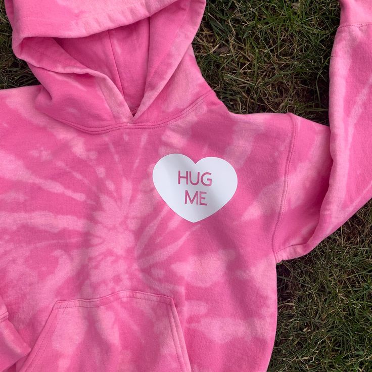 "Sweet Heart Personalized Pink Tie Dye Sweatshirt // Valentines' Hoodie // Adult or Youth hoodie // Pink Tie Dye Sweatshirt // Conversation Heart Sweatshirt Valentines Day is right around the corner and it's on our mind. This perfectly pink hoodie is the super comfy and adorable for both Ladies and littles :) Heart can be customized with a name or other \"sweet heart\" conversation heart. Here is just a few; \"Be Mine\" \"Kiss Me\" \"XOXO\" \"Call me\" \"Stay home\" and the list goes on and on. Valentines Hoodie, Tie Dye Sweatsuit, Tie Dye Loungewear, Tie Dye Crewneck Sweatshirts, Conversation Heart, Dye Sweatshirt, Heart Hoodie, Sweatsuit Set, Heart Sweatshirt