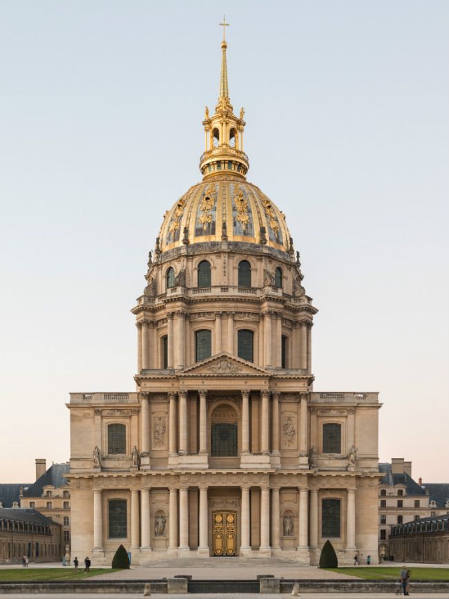 a large building with a golden dome on top