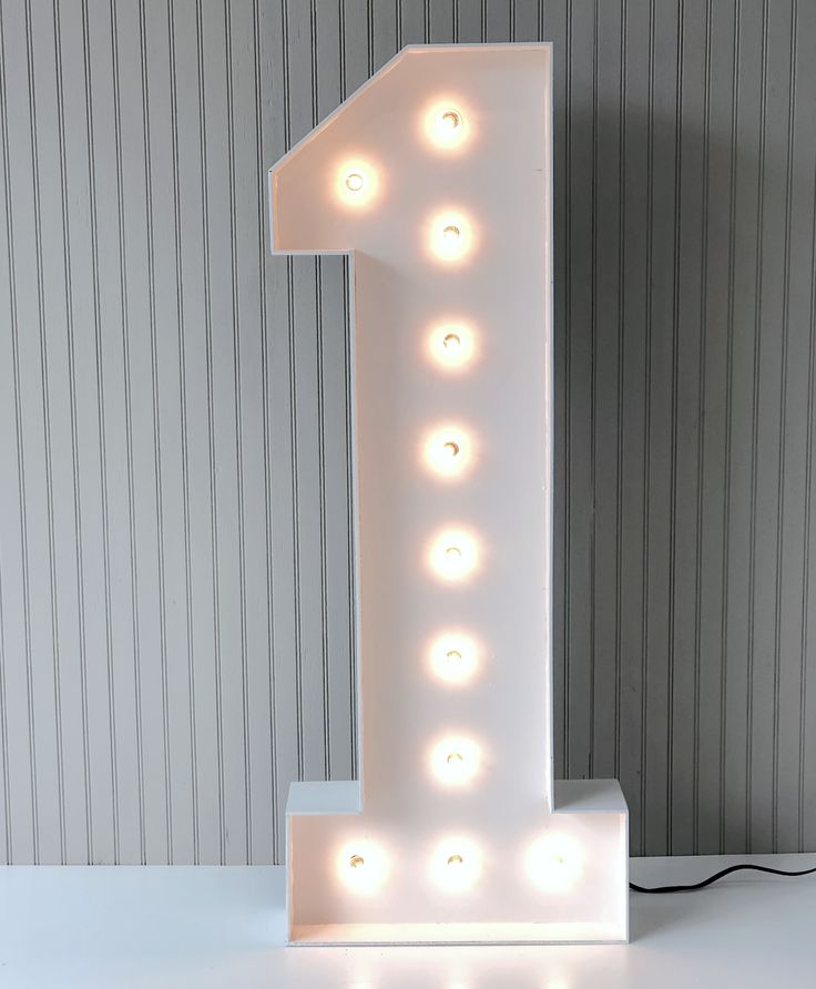 This image is of a white 4ft tall number 1 that is lighted with bulbs. Tag Us On Instagram, Marquee Numbers, Number 1, Number One, Kids Birthday, 1st Birthday, Birthday, On Instagram, Instagram