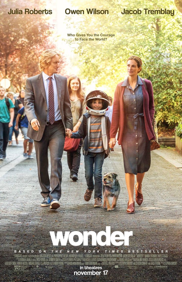 a movie poster with people walking down the street and a dog sitting on the sidewalk